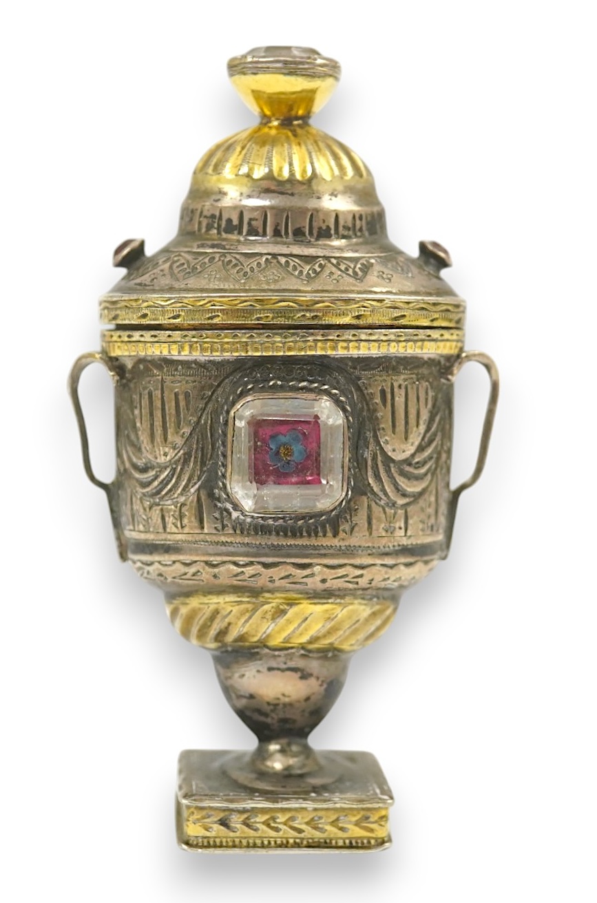 A 19th century continental parcel gilt silver and gem set double ended pill box, modelled as a two handle vase